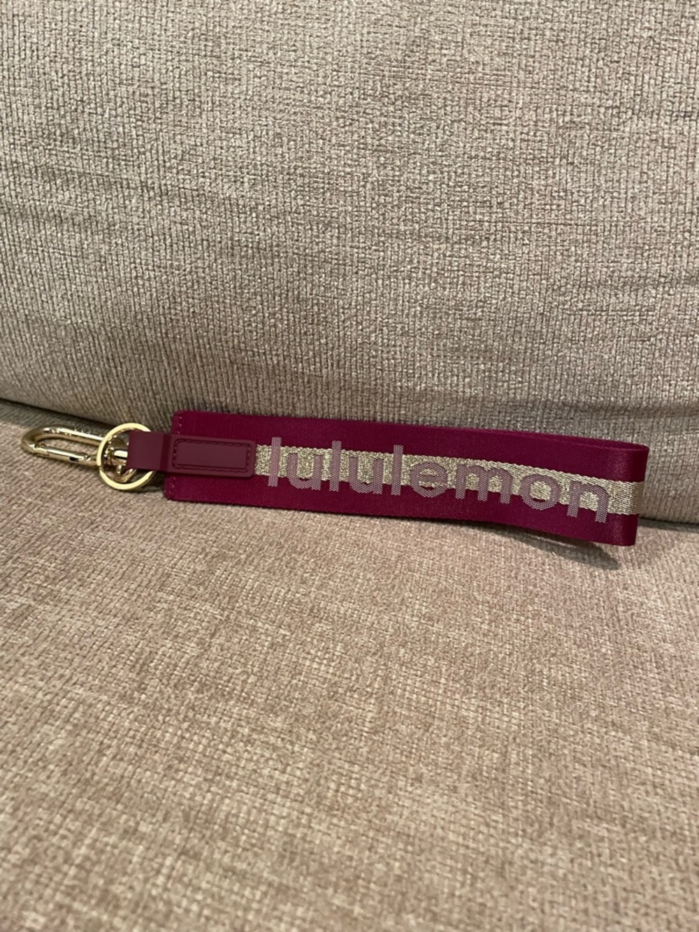 lululemon athletica Magenta Wristlet with Gold Hardware